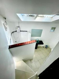 a bathroom with a sink and a toilet in a room at White house bailan resort in Ko Chang