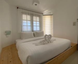 Postel nebo postele na pokoji v ubytování White house bailan resort