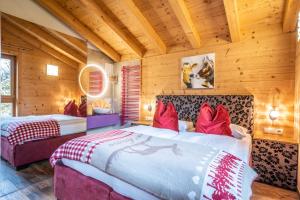 Letto o letti in una camera di The Kaprun Edition - Luxury Chalets & Style Suites
