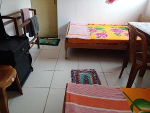 Letto o letti in una camera di Jayanthi Surf Dreams