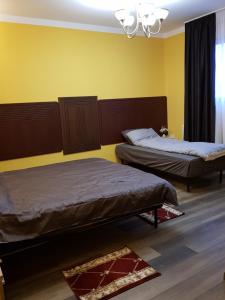 Кровать или кровати в номере Hotel Restaurant La Passione