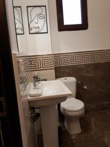 Koupelna v ubytování Hotel Restaurant La Passione