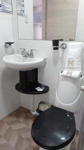 Een badkamer bij Hotel Meraki Popayán
