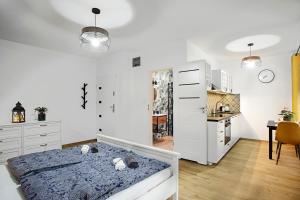 a bedroom with a bed with stuffed animals on it at Na zielonym Widoku in Wrocław