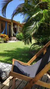 Un jardín fuera de Chalés Vale da Lua - Praia do Rosa 16 fotos más