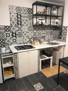 A kitchen or kitchenette at dimora ursino