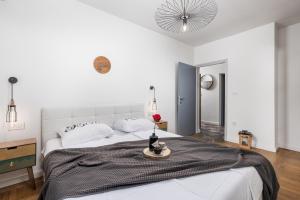 Posteľ alebo postele v izbe v ubytovaní Apartment Mak