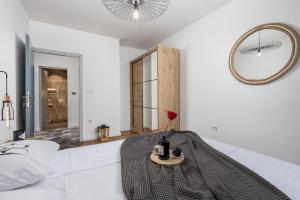 Posteľ alebo postele v izbe v ubytovaní Apartment Mak