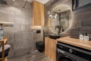 Kuchyňa alebo kuchynka v ubytovaní Apartment Mak + 20 fotografií