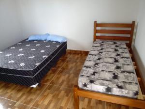 Postel nebo postele na pokoji v ubytování Hospedaria Mar&Bela + 25 fotografií