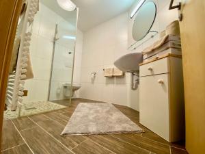 Koupelna v ubytování Ferienhaus Oberhuben + 37 fotografií