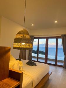 Ein Bett oder Betten in einem Zimmer der Unterkunft High Life Villas