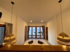 Ein Bett oder Betten in einem Zimmer der Unterkunft High Life Villas