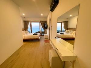 Ein Bett oder Betten in einem Zimmer der Unterkunft High Life Villas