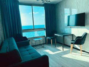 Χώρος καθιστικού στο Carmel Holiday Apartments