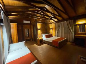 an overhead view of a bedroom with a bed and a couch at Ensoinn Hotel in Fethiye +147 photos