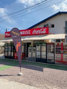 a metal cone in front of a store at Vila Sunrise in Vama Veche