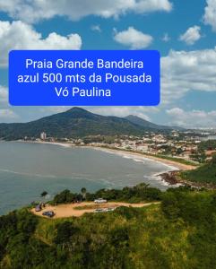 an island in the middle of a body of water at Vó Paulina suites in Penha