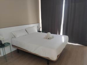 Posteľ alebo postele v izbe v ubytovaní Casa Anton - Villa ideal familias y grupos grandes, piscina privada