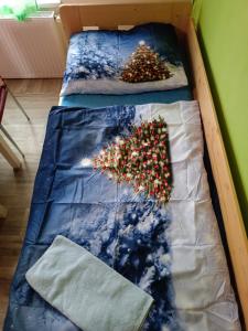 Cama ou camas em um quarto em Penzion na samotě
