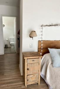 Una cama o camas en una habitación de Calida y acogedora casa ubicada en barrio residencial