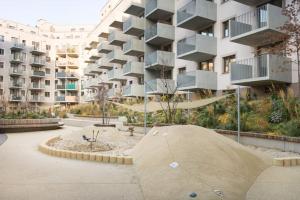 a skate park in front of a building at Premium City Apartment with balcony! Free Garage Parking included! in Vienna