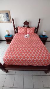 Letto o letti in una camera di Fisherman's Inn Hotel