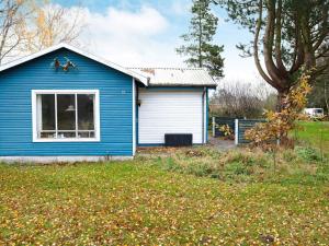 O grădină în afara 4 person holiday home in Rødby-By Traum