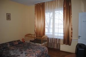 Postel nebo postele na pokoji v ubytování Daugavkrasti Hotel