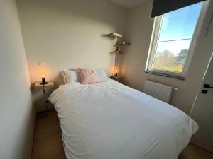 Rúm í herbergi á Holiday Home near Château de Modave