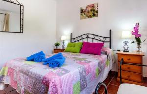 Ένα ή περισσότερα κρεβάτια σε δωμάτιο στο Stunning Home In Nerja With Wifi