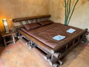 Postel nebo postele na pokoji v ubytování Akha River House CR