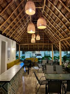מסעדה או מקום אחר לאכול בו ב-Penthouse Manzanillo exclusivo con alberca