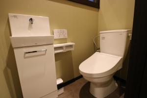 a bathroom with a toilet and a sink at Yadoya Matsumoto Honjo - Vacation STAY 13372v in Matsumoto