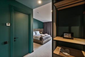 Katil atau katil-katil dalam bilik di Graf Hotel