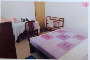 Letto o letti in una camera di Jayanthi Surf Dreams