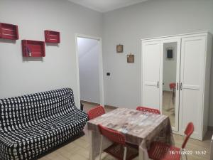 A seating area at Certe notti