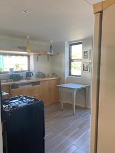 Køkken eller tekøkken på Bedford Way cottages