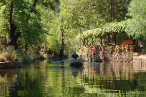 a man in a row boat on a river at Dalya Life in Göcek