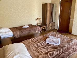Letto o letti in una camera di Gudauri Hillsite