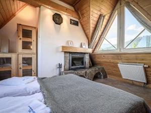 Posteľ alebo postele v izbe v ubytovaní VistZakopane - Polarny Apartment