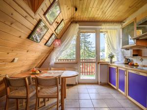Kuchyňa alebo kuchynka v ubytovaní VistZakopane - Polarny Apartment
