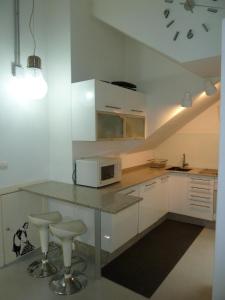 Kuchyň nebo kuchyňský kout v ubytování Oktheway Loft Santander Street