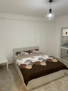 Giường trong phòng chung tại Garsoniera Tineretului