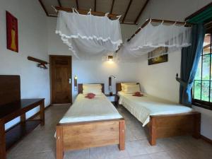 Letto o letti in una camera di Zion View Ella Green Retreat
