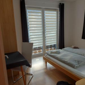 Postel nebo postele na pokoji v ubytování Haus Mundl