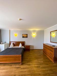 Postel nebo postele na pokoji v ubytování Hotel Palma + 37 fotografií