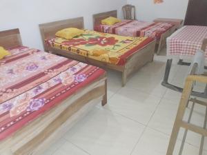 Letto o letti in una camera di Jayanthi Surf Dreams