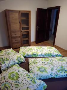 Postel nebo postele na pokoji v ubytování White Hawk - Vila Sokolík