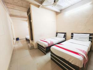 Postel nebo postele na pokoji v ubytování Hotel Avion Park - Near Mumbai International Airport
